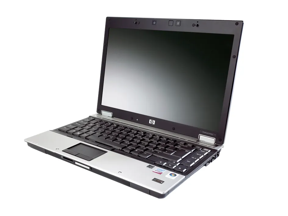 Professional news article featured image: A sleek and modern HP EliteBook 6930p laptop, open on a wooden desk, with its screen displaying a vibrant workspace. The background is softly blurred to emphasize the laptop's design and features.. High quality, editorial style, suitable for news website, 1200x630 pixels, modern design