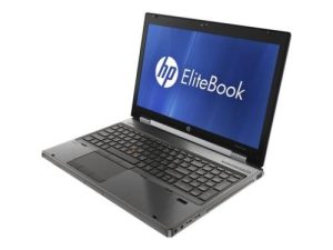 Professional news article featured image: A high-resolution image of the HP EliteBook 8560w laptop, showcasing its sleek design, illuminated keyboard, and professional build in a modern office setting.. High quality, editorial style, suitable for news website, 1200x630 pixels, modern design