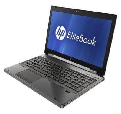 Professional news article featured image: A high-resolution image of the HP EliteBook 8560w laptop, showcasing its sleek design, illuminated keyboard, and professional build in a modern office setting.. High quality, editorial style, suitable for news website, 1200x630 pixels, modern design